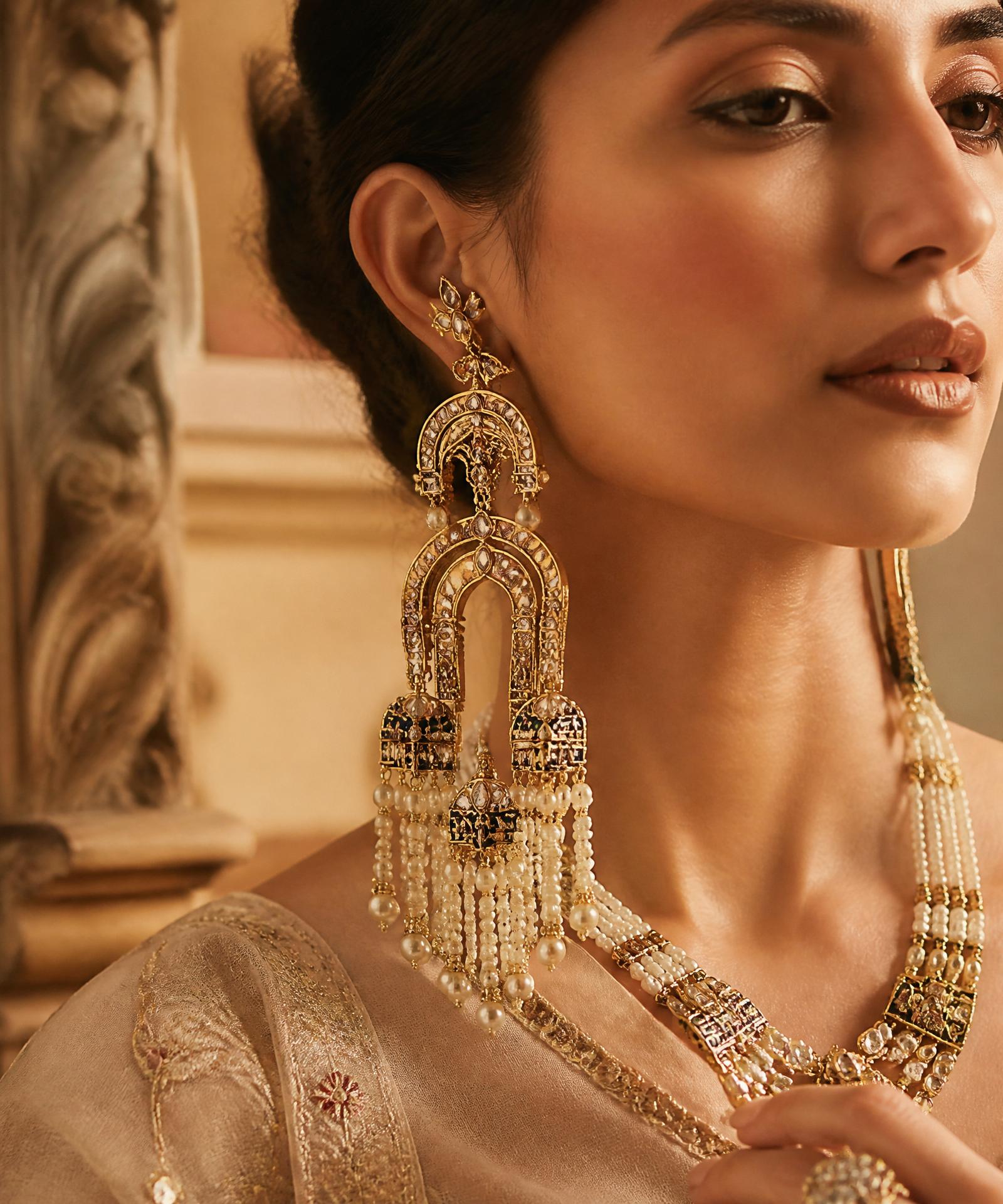 Model wearing HAZEL Royal Aviary earrings